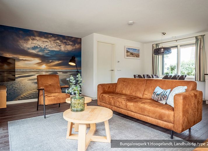 Bungalowpark 't Hoogelandt vacation home in De Koog, Texel with thatched roof and sunny terrace.