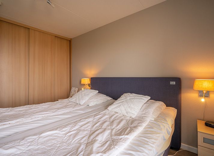 Gemuetliche Sitzecke im Apartment Juliana 116 Zeezicht, De Koog, Texel mit Panoramablick ueber das Wattenmeer.