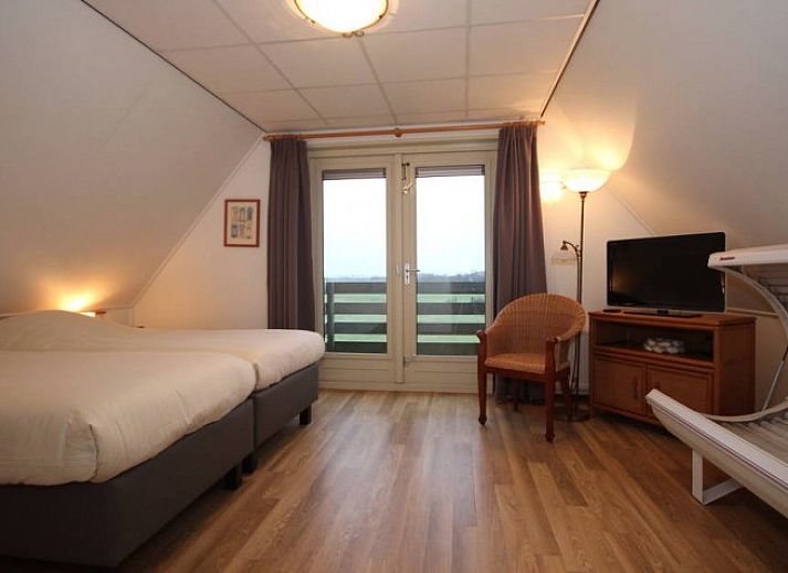 Geraeumiges Wohnzimmer in 6-Personen-Villa mit viel Luxus, Ferienhaus in De Koog, Texel mit moderner Kueche.