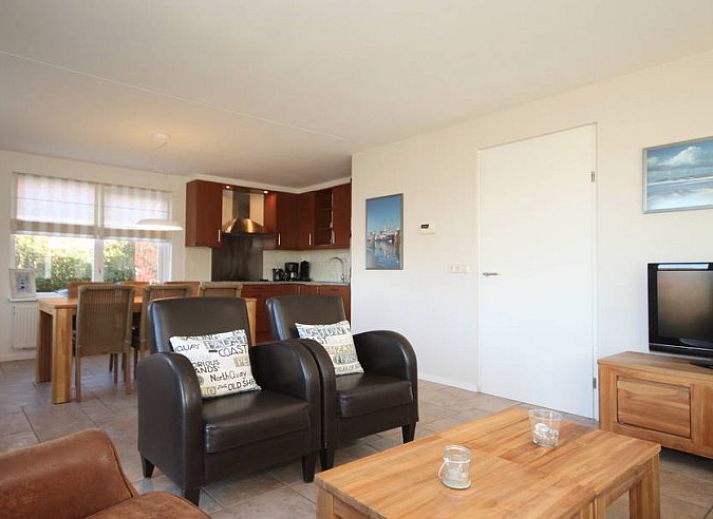 6 Person luxury villa in De Koog, Texel with charming frontage and green garden for a relaxing stay.