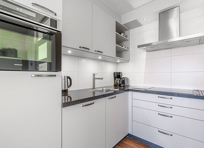 Bedroom in Apartment Juliana 154 Zeezicht, De Koog, Texel with comfortable bed and beautiful sea view.