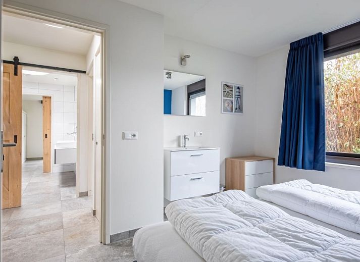 Luchtfoto van Orchismient 20, De Koog, Texel, vakantiehuis in groene omgeving.