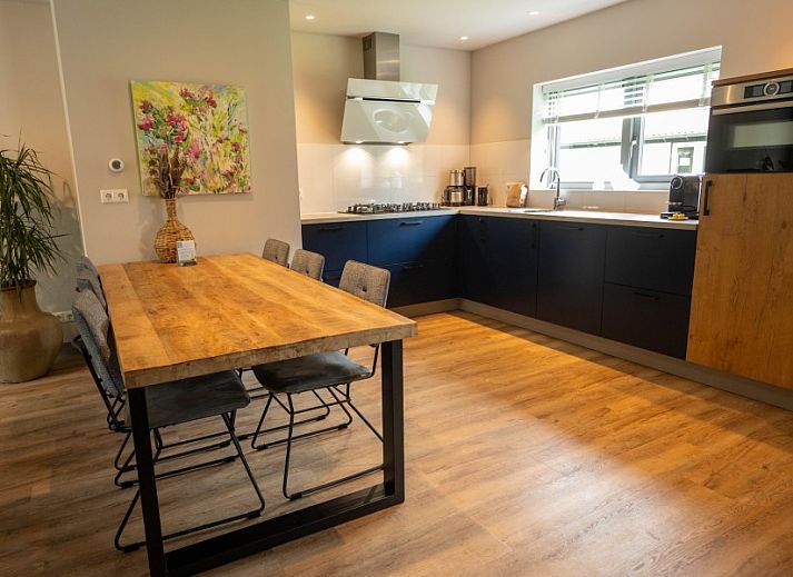 Landgoed Springtij Stulpje, vakantiehuis in De Koog, Texel met moderne buitengevel en groene omgeving.