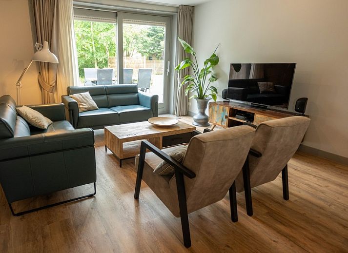 Landgoed Springtij Stulpje in De Koog, Texel, omringd door weelderige natuur en rustgevende omgeving.