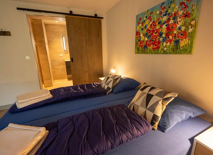 Gezellig vakantiehuis Landgoed Springtij Stulpje in De Koog, Texel, met ruim terras en groen uitzicht.