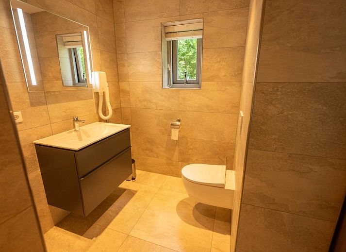 Gezellig vakantiehuis Landgoed Springtij Stulpje in De Koog, Texel, met ruim terras en groen uitzicht.