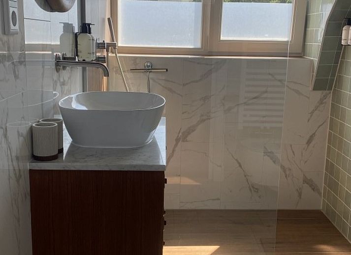 Stijlvolle woonkamer in vakantiehuis Paal 234, De Koog, Texel.