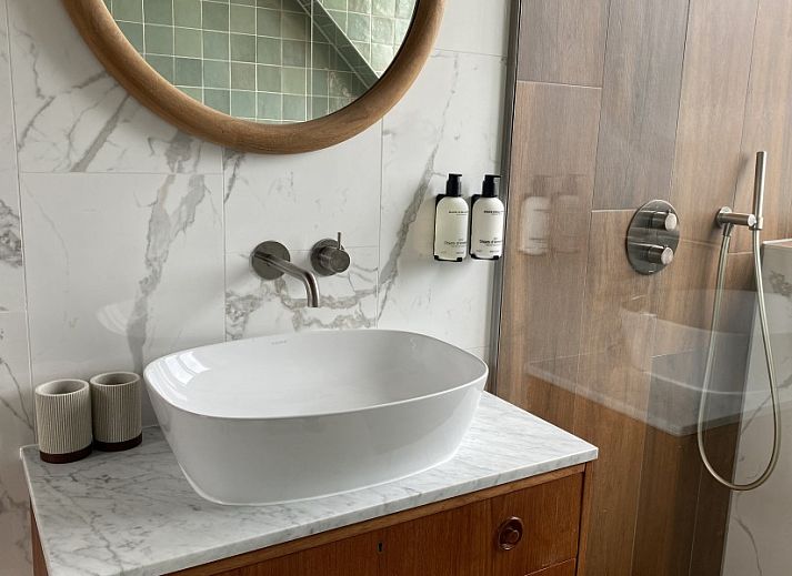 Stijlvolle woonkamer in vakantiehuis Paal 234, De Koog, Texel.