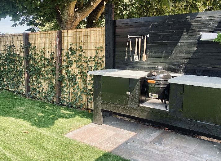 Ruime zitkamer in Paal 234, een vakantiehuis op Texel, De Koog.