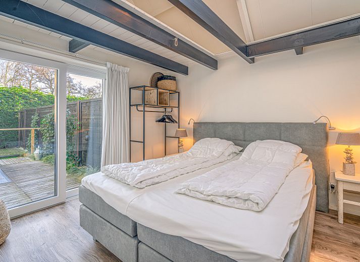 Gemuetliches Wohnzimmer im Appartement Zee van Tijd, De Koog, Texel. Gemuetlicher Innenraum zum Entspannen.