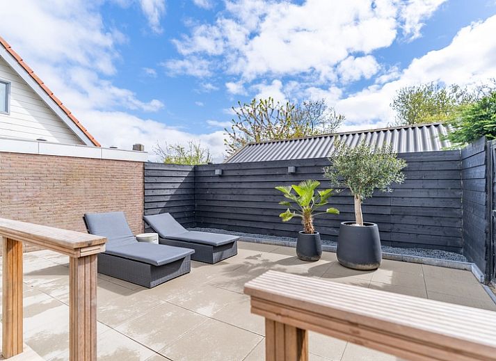 Helle Sitzecke im Appartement Zee van Tijd, De Koog, Texel. Idealer Ort fuer Erholung auf den Watteninseln.