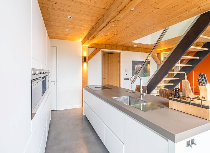 Vacation home Villa 191 with Hot tub in De Koog, Texel, offers a stylish terrace with beautiful garden views.