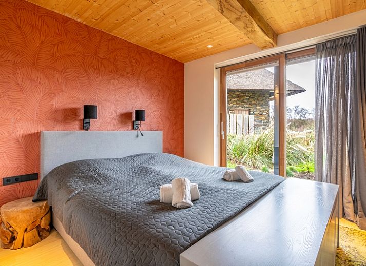 Vacation home Villa 191 with Hot tub in De Koog, Texel, offers a stylish terrace with beautiful garden views.