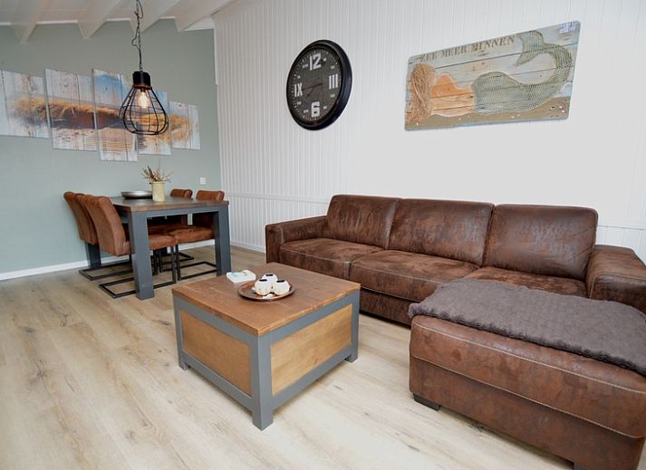 Cozy living room of Motel Texel - Apartment 314/1S in De Koog, Texel, with comfortable seating area.