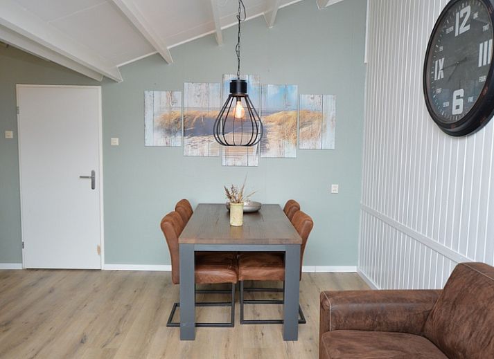 Cozy living room of Motel Texel - Apartment 314/1S in De Koog, Texel, with comfortable seating area.