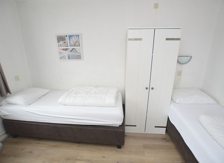 Spacious kitchen and dining area in Motel Texel - Apartment 314/1S, De Koog, with modern amenities.