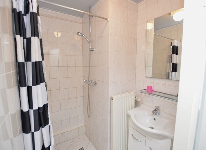 Spacious kitchen and dining area in Motel Texel - Apartment 314/1S, De Koog, with modern amenities.