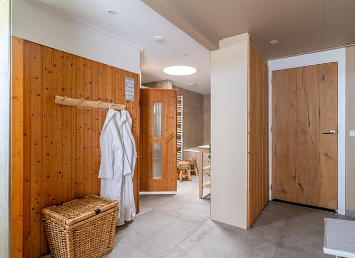 Dining area in Cottage in De Koog, Texel, overlooking green fields, Wadden Islands.