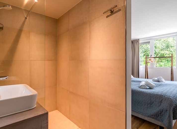 Modern living room in Cottage in De Koog overlooking terrace, Texel, Wadden Islands.