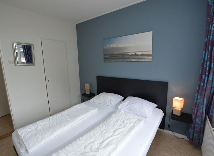 Bright living space of Apartment Kerckeland 122 in De Koog, Texel with comfortable seating.