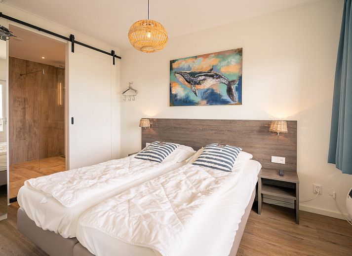 Lichte woonruimte in Appartement Juliana 176 Eilandzicht, De Koog, Texel, ideaal voor ontspanning op de Waddeneilanden.