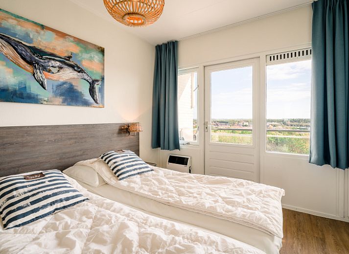 Lichte woonruimte in Appartement Juliana 176 Eilandzicht, De Koog, Texel, ideaal voor ontspanning op de Waddeneilanden.
