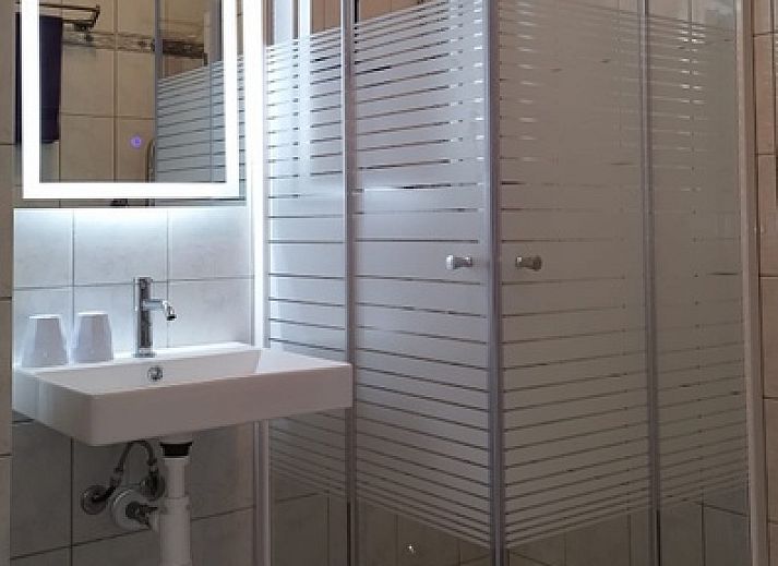 Stilvolle Essecke in 't Kerckeland - Appartement Kerckeland 82, De Koog, Texel, perfekt fuer eine entspannte Mahlzeit auf den Watteninseln.