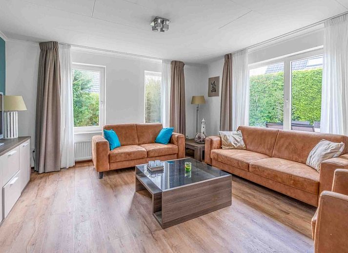 Exterior of Holiday home Honeysuckle 49 in De Koog with spacious garden, perfect for a Texel vacation.