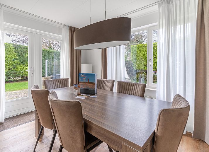 Exterior of Holiday home Honeysuckle 49 in De Koog with spacious garden, perfect for a Texel vacation.