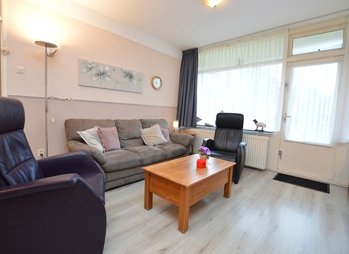 Cozy living room of Apartment Kerckeland 70 in De Koog, Texel with comfortable seating area.