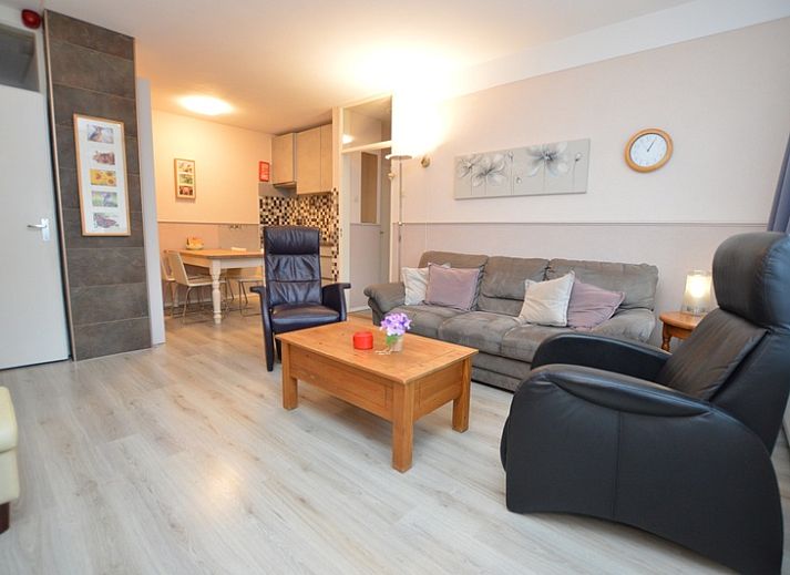 Cozy living room of Apartment Kerckeland 70 in De Koog, Texel with comfortable seating area.