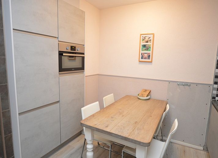 Cozy living room of Apartment Kerckeland 70 in De Koog, Texel with comfortable seating area.