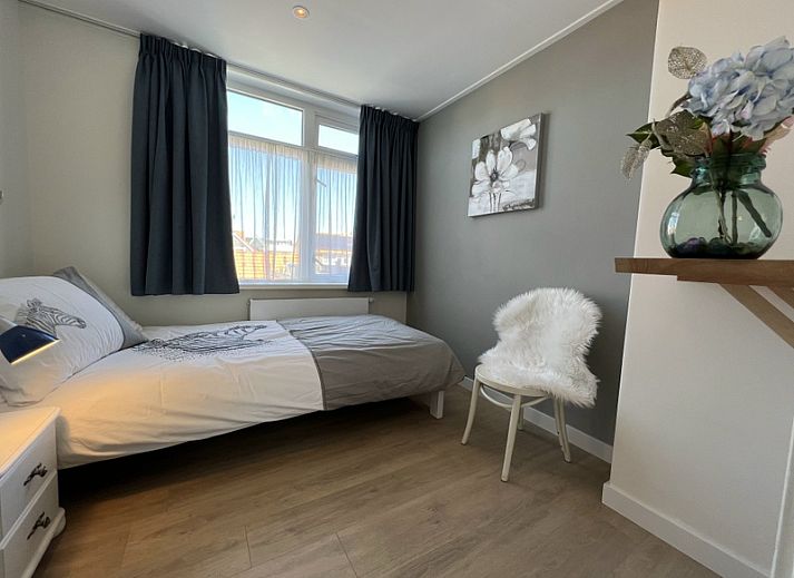 Stylish living room of Holiday home Duinzee Texel in De Koog with comfortable seating.