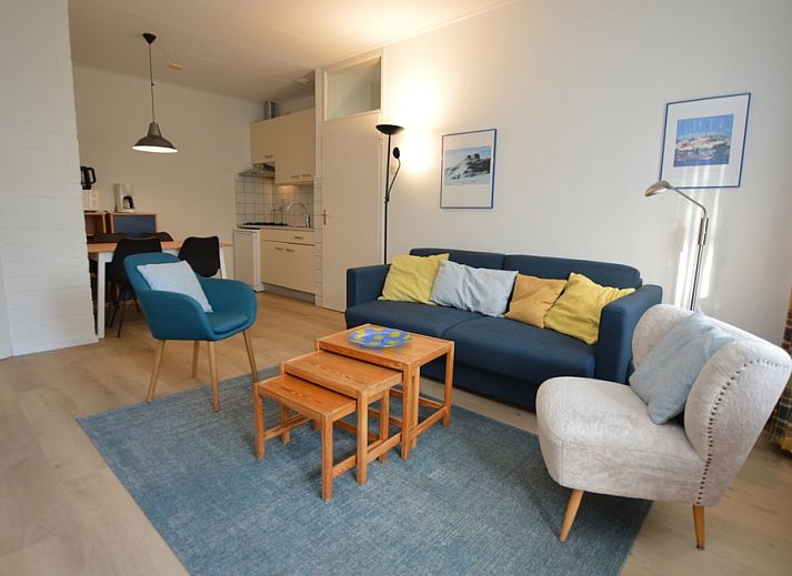 Cozy living room in Apartment Kerckeland 126, De Koog, Texel, with comfortable seating area and modern furnishings.