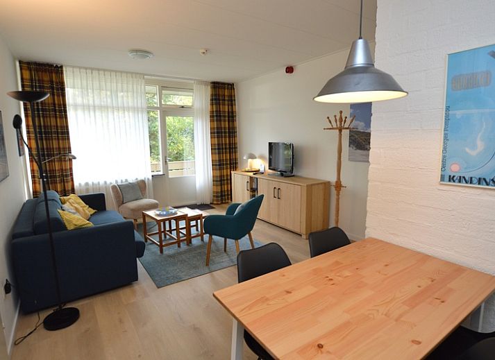 Cozy living room in Apartment Kerckeland 126, De Koog, Texel, with comfortable seating area and modern furnishings.