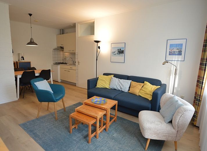 Cozy living room in Apartment Kerckeland 126, De Koog, Texel, with comfortable seating area and modern furnishings.