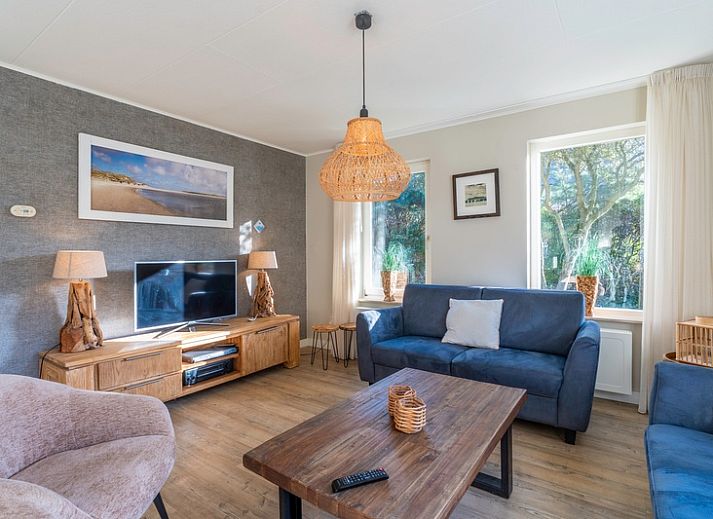 Vacation home Honeysuckle 57 in De Koog, Texel with spacious garden and terrace for relaxation on the Wadden Islands.