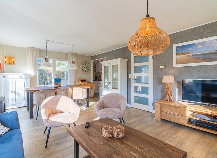 Vacation home Honeysuckle 57 in De Koog, Texel with spacious garden and terrace for relaxation on the Wadden Islands.