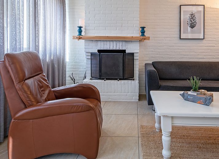 Spacious terrace at 32a Castor vacation home in De Koog, Texel, ideal for outdoor breakfasts.