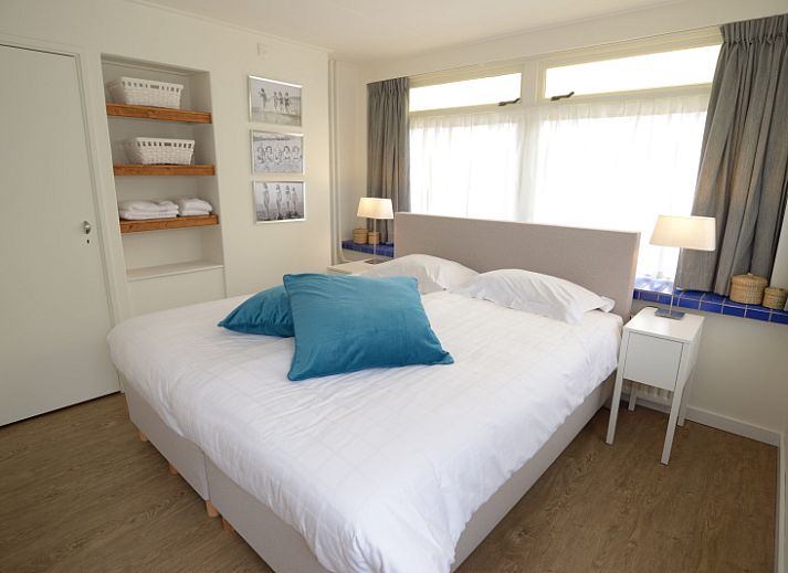 Cozy living room in Grand Hotel Opduin - Holiday home B, De Koog, Texel with comfortable seating area and views of nature.