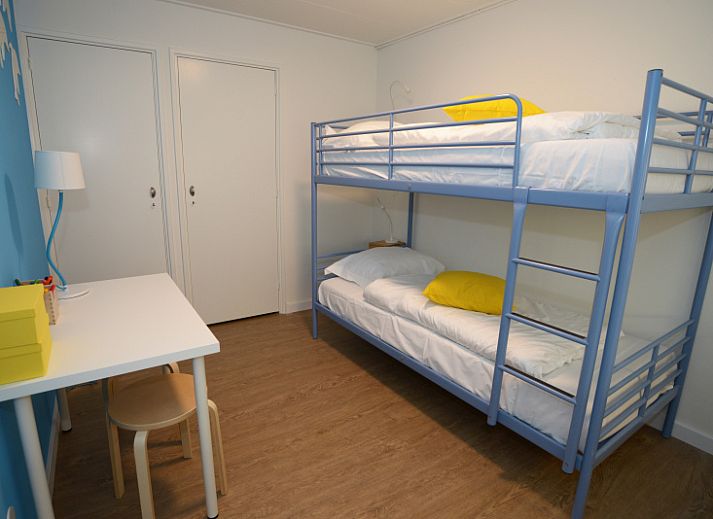 Cozy living room in Grand Hotel Opduin - Holiday home B, De Koog, Texel with comfortable seating area and views of nature.