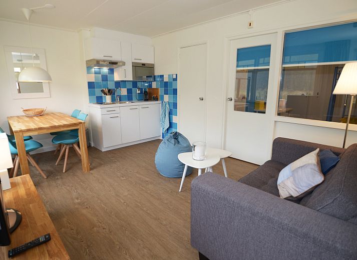 Exterior of Grand Hotel Opduin - Holiday Apartment B, De Koog, Texel with charming architecture and cycling guests.