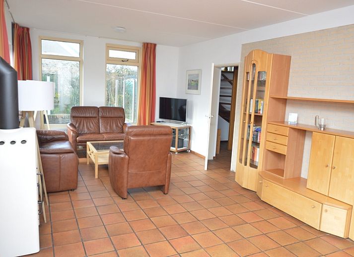 Vacation home Stappeland 199 in De Koog on Texel with sunny terrace and green garden, ideal for relaxation on the Wadden Islands.