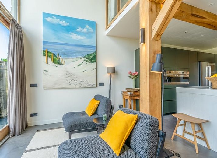 Cozy living room in cottage in De Koog overlooking Texel dunes.