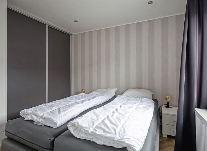 Cozy sitting area in Chalet Bregkoog 162, De Koog, Texel, perfect for relaxing after a day on the Wadden Islands.