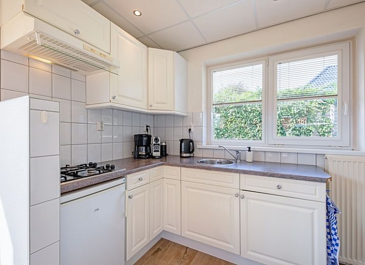 Aerial photo of Vogelweelde vacation home, De Koog, Texel, surrounded by green nature.