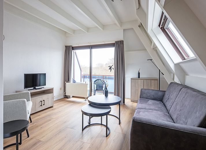 Bright living room in Two persons apartment large - second floor, De Koog, Texel with view of nature.