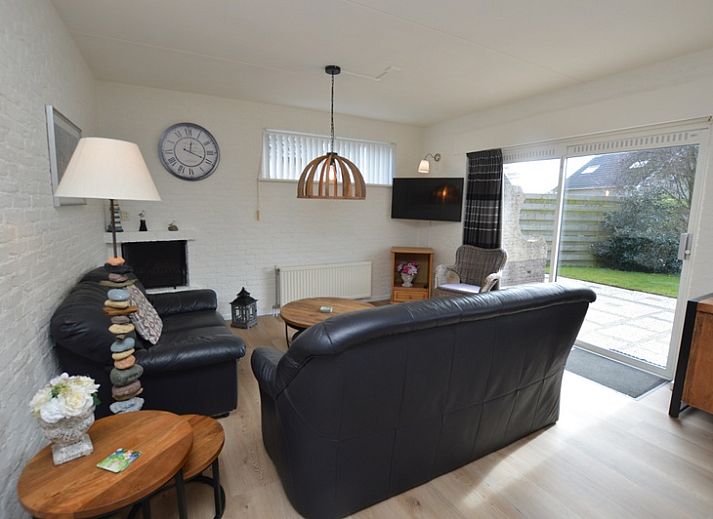 Vacation home Stappeland 205 in De Koog, Texel offers a charming exterior with an inviting terrace and green surroundings.