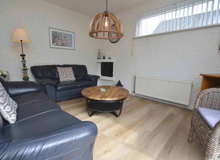 Vacation home Stappeland 205 in De Koog, Texel offers a charming exterior with an inviting terrace and green surroundings.