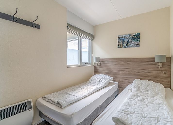 Helles Wohnzimmer mit bequemen Sitzgelegenheiten im Apartment Juliana 156 Zeezicht, De Koog, Texel.